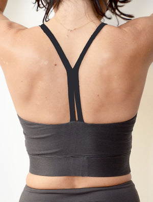 back view of female model wearing the wrap crop top