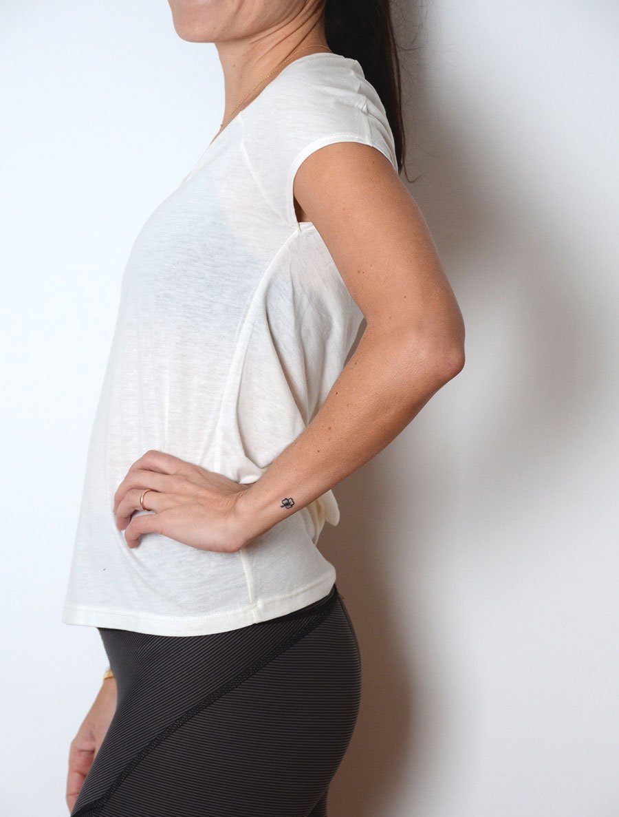 Side view of model wearing simulacra's Draped Back T-shirt 